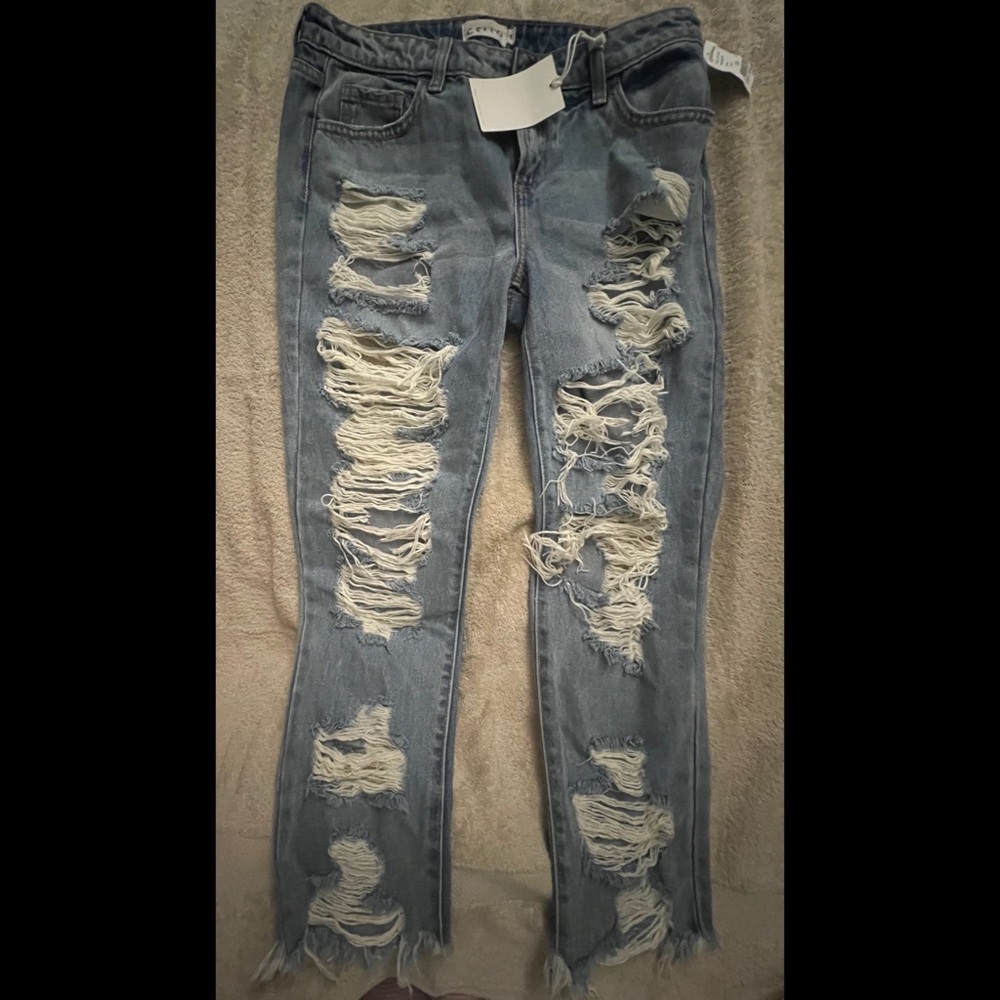Light Blue Jeans, size 05, never been worn, still has tags attached to them.